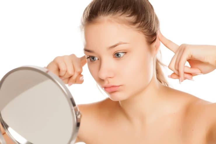 quando é recomendado uso de brincos novamente pós blefaroplastia?
